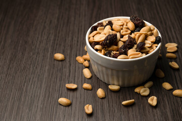 Bowl of Peanuts and Raisins Healthy Snack