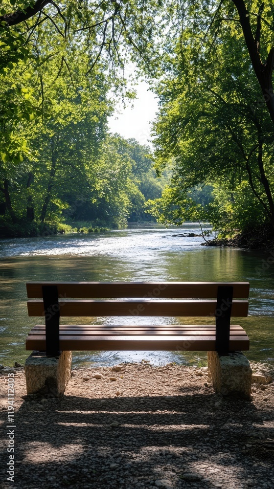 Poster a peaceful riverside bench with a view of gently flowing water, surrounded by trees and a soft breez