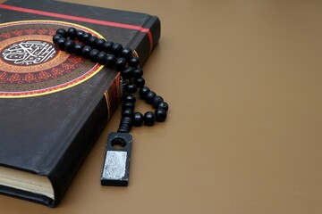 Al Quran and prayer beads