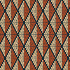 A seamless geometric pattern featuring bold triangular shapes with alternating earthy tones of orange, cream, and dark blue. Perfect for backgrounds, textiles, and graphic design projects.