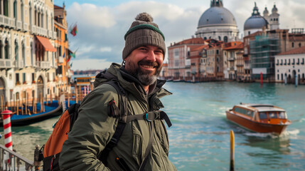 Obraz premium A tourist man person enjoys a picturesque view of the Grand Canal while exploring Venice, Italy By 