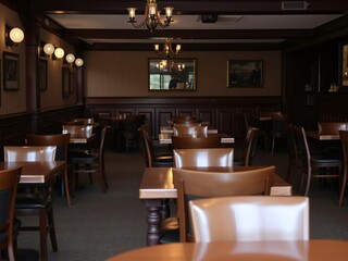 Empty chairs and tables outside a closed traditional British pub, chairs, empty, tables