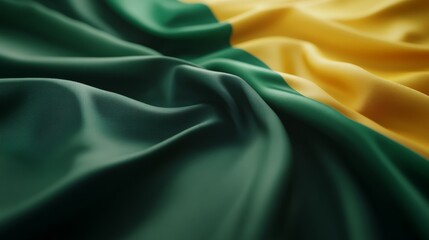 Fototapeta premium The Brazilian flag gracefully waves on fabric, showcasing vibrant green and yellow tones under soft lighting, perfect for adding celebratory text or design