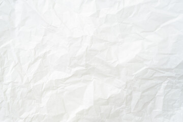 Top view and full frame of wrinkled or crumpled white paper texture used as crumpled white paper background texture in decorative art work