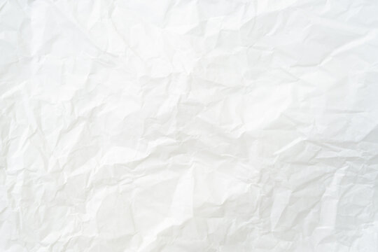 Top view and full frame of wrinkled or crumpled white paper texture used as crumpled white paper background texture in decorative art work