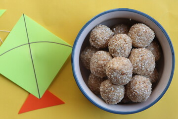 Til gul ladu or sesamum ladoo or sesame laduu, sweet balls made with sesame, peanuts and jaggery, Indian festival food