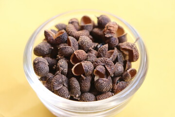 Sichuan pepper or Sichuanese pepper, Szechuan pepper, Chinese prickly ash, Chinese pepper, in a glass bowl