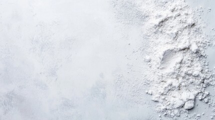 Obraz premium Fine White Flour Spread on a Light Gray Surface with Subtle Texture Creating a Culinary Scene Perfect for Baking or Cooking Concepts and Recipes