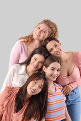 Obraz premium Group of young women on light background