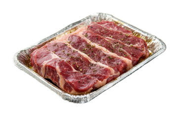 Marinated steaks, aluminum tray, white background, ready to cook