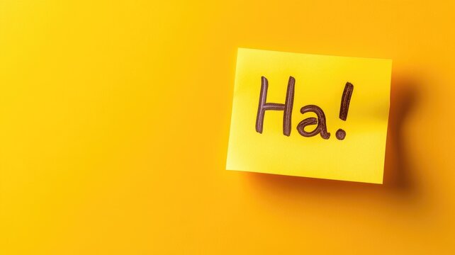 Yellow sticky note with "Ha!" written on it against background