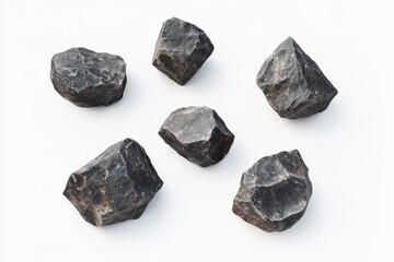 Six dark grey rough rocks isolated on white.