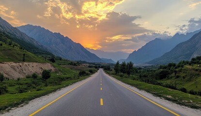 Naklejka premium Scenic mountain road at sunset. (1)