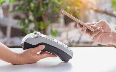 Contactless payment by smartphone. Payment with NFC technology
