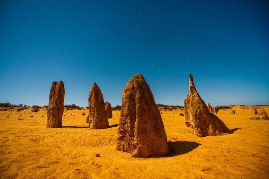 Rocks in the desert illuminated by the moonlight, Nambung National Park, Western Australia