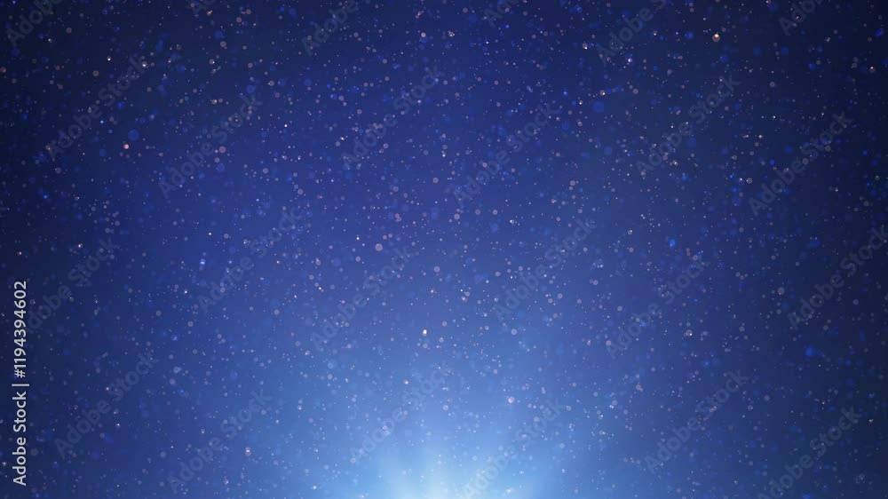 Poster scintillating glitter particles falling rapidly against a deep blue gradient background with light r