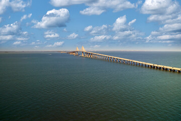 Aerial view of Sunshine Skyway Bridge over Tampa Bay in Florida with moving traffic. Concept of transportation infrastructure