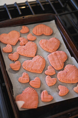 Pink Heart Shaped Valentines Day Cookies On A Pan