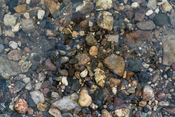 Submerged Stones Beneath Gentle Ripples