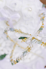 Greek Orthodox bridal jeweled headpiece with pearls and gold beads.