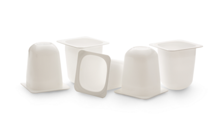 Empty crushed plastic yogurt pots