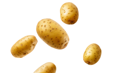  several unpeeled, golden brown potatoes floating against a clean white background. The potatoes vary slightly in size and shape, 