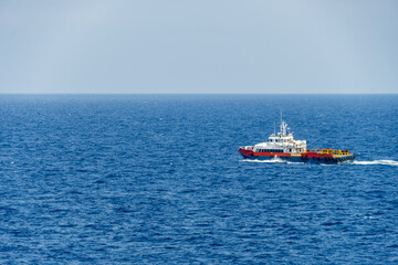 An offshore crew boat sailing at offshore oil field
