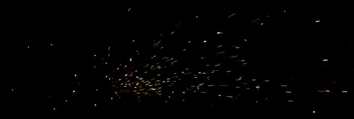 A dark sky with many small lights in it