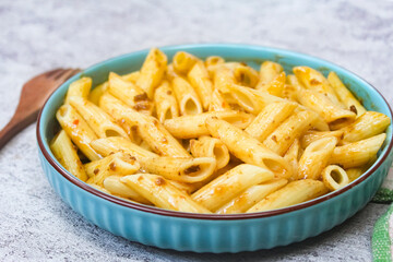 a plate of penne pasta