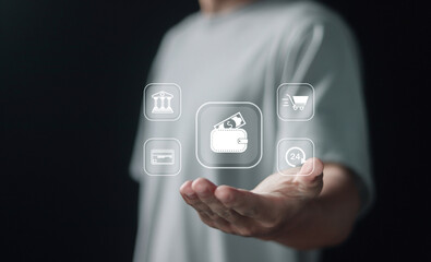 Person holding E-wallet application icon on virtual screen for Digital wallet payment concept. online money transaction, transfer, credit card and financial.