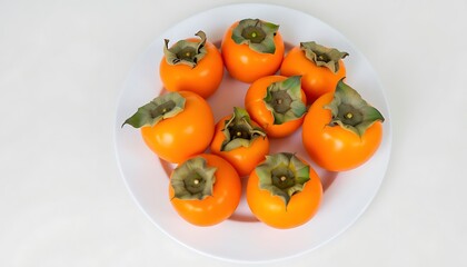 Ripe Persimmon Fruit on White Plate: A Vibrant Still Life