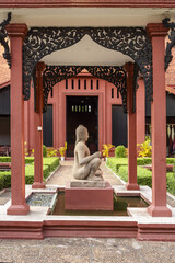 Stone statue of the Leper King in the courtyard of The National Museum of Cambodia, a fine example...