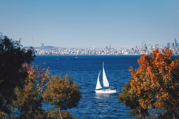 a white yacht in the Bosphorus Strait. Istanbul Marmara Sea Tour by luxury boat