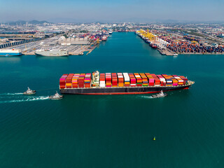aerial view cargo logistic container ship sailing in sea, import export goods and distributing...