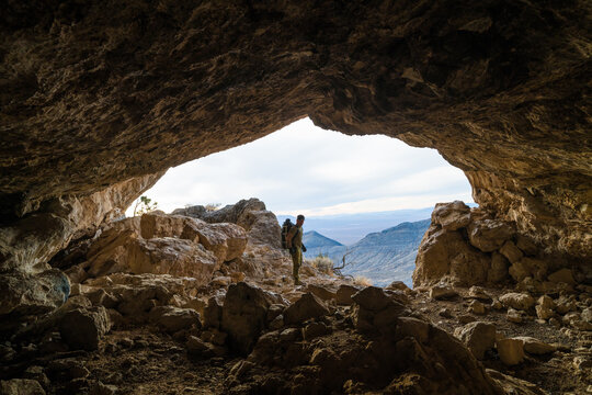 Archaeologist explores large cave for hidden artifacts