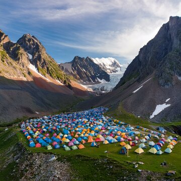 Generated image Overhead view of a base camp with colorful tents at the foot of towering mountains
