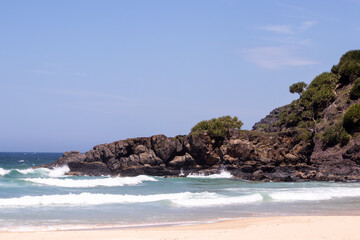 Fototapeta premium Sandy beach and rock cliff in Australia