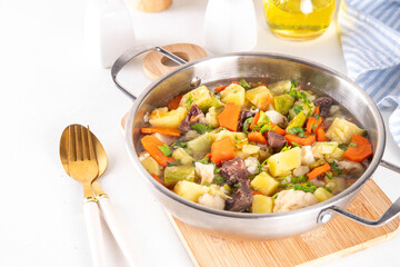 Comfort warm autumn food, one pot full vegetable stew soup