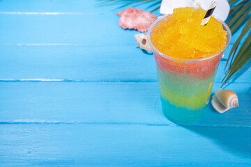 Colorful slushie drink, multicolored frozen juice cocktail
