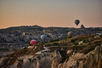 Balloons lifted into the air in Cappadocia. Entertainment and tourist attraction. A spectacular sight
