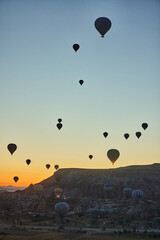 Balloons lifted into the air in Cappadocia. Entertainment and tourist attraction. A spectacular sight