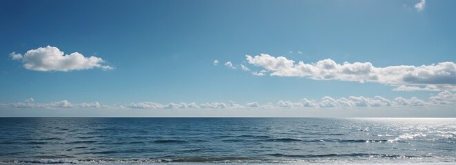 there is a person walking on the beach with a surfboard