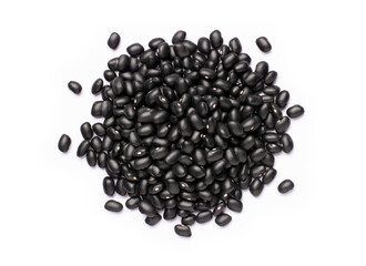 Pile of black beans (Urad dal, black gram, vigna mungo bean) isolated on white background. Top view.