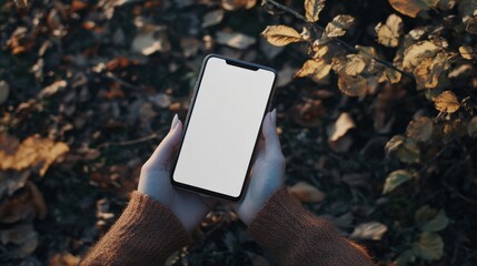 A technology-focused photo of a smartphone with a blank white screen in a woman&acirc;&euro;&trade;s hand, styled for mockups and minimalist designs --ar 16:9 --v 6.1 Job ID: f00afd41-e3ee-42b5-a3f8-3946ddc725e2