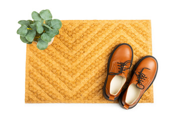 Door mat. Welcome mat isolated on white background. Women's shoes on a doormat on a white...