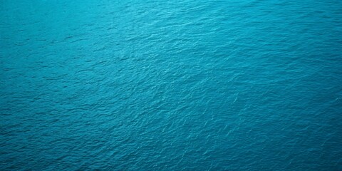 Blue ocean-inspired textured background with subtle wave patterns, rich aquatic tones, and a calming aesthetic perfect for modern creative design projects