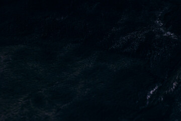 Dark Waters with Subtle Sparkles and Intricate Textures, Capturing Natures Mystery and Calmness