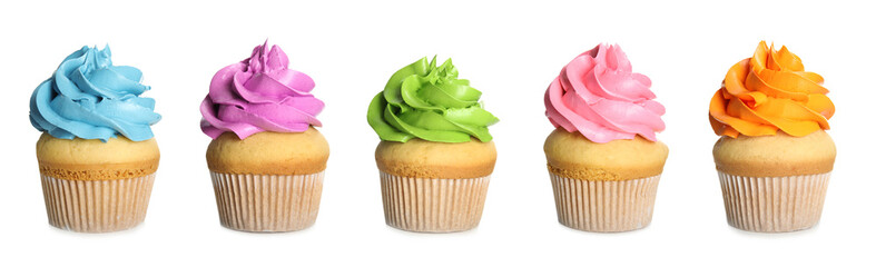 Tasty cupcakes with cream isolated on white, set