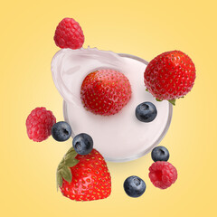 Fresh berries falling into glass of yogurt on golden background, top view