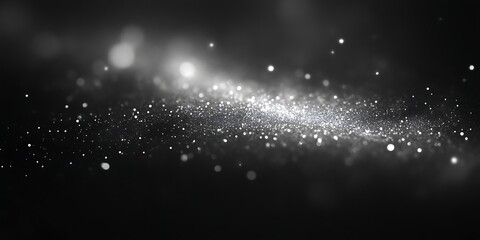 Fototapeta premium Abstract silver glitter on black background.